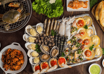 an hai san co nen uong nuoc cam