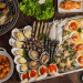 an hai san co nen uong nuoc cam